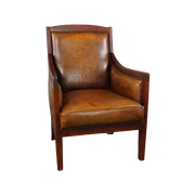 Schapenleren Fauteuil In Combinatie Met Warm Kleurig Hout